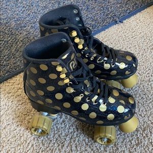 Gold and black roller skates